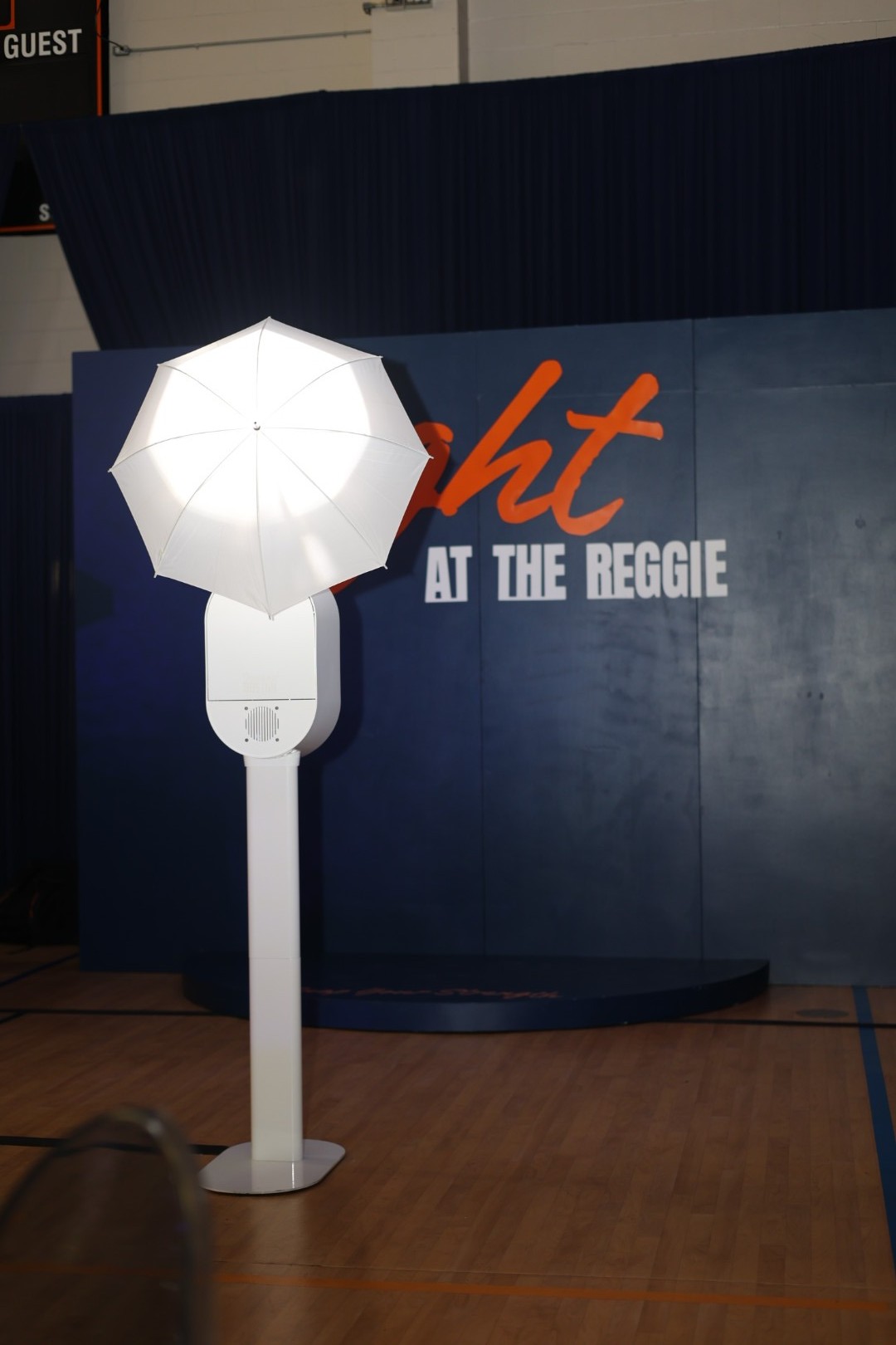 Photo booth with umbrella light at a Reggie event